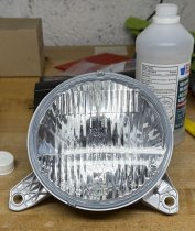 (63178352023)-Fog Light Assembly-740i/750i (95-01) (Left) (Hella) (small internal housing crack) (Hella/OEM) (1 available)