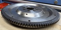 (11221270292)-Flywheel (Std Trans)-2002 (74-76), 320i (77-83) (215mm) (Genuine BMW) (1 available)