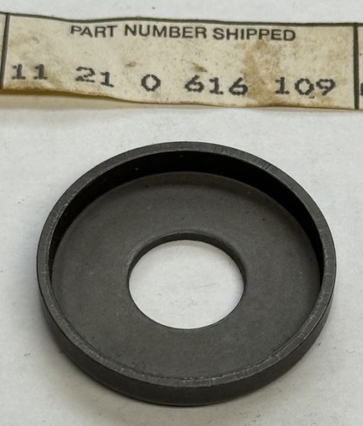 (11211744342)-Cover Plate for Pilot Bearing felt washer (alt-11210616109)-fits most BMW (1967-2005) (Genuine BMW) (1 available)