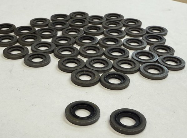 (11141435968)-Rear Main Seal Bolt Gasket (6 per car)-E32/E34, E38/E39, E31 (w/4 liter engines) (Genuine BMW) (41 available) (Lot pricing)